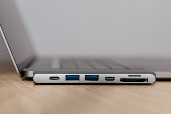 Docking Stations That Replace Three Cables with One